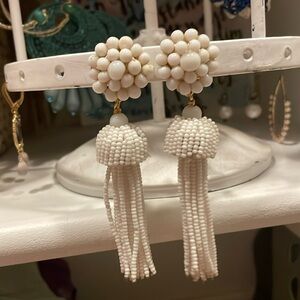 White beaded statement earrings